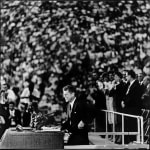 Black and white photograph of John F Kennedy during his campaign speaking to a crowd