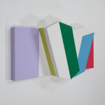 Detail of Tridimensional painting of four flattened cubes at varying angles each with one side painted. From left to right: lavender, green, blue, pink