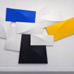 Tridimensional painting of interconnected parallelepipeds in white, yellow, blue, and black