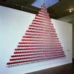 Art installation, pyramid of “Cloud of Mushroom” soup cans in the style of Campbell Soup mounted on wall