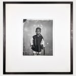Framed black and white vintage photograph of a young boy in Guangzhou, China