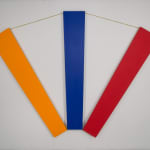Tridimensional artwork of three rectangles connected by chord (orange, blue, red), looking like a fan