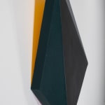 Detail of Tridimensional painting of a black & navy blue prism with triangular sides, looking like a cut gem