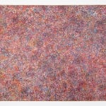 Abstract red painting created with thousands of minuscule circles with multiple underlying patterns in various blues, purples, and oranges