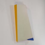 Detail of Pearly white tridimensional painting of two interconnected rhomboid prisms with yellow and blue sides