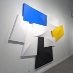 Detail of Tridimensional painting of interconnected parallelepipeds in white, yellow, blue, and black