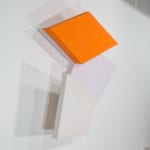 Detail of Tridimensional painting of interconnected parallelograms in orange, white, and beige