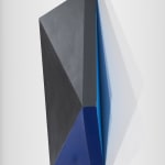 Detail of Tridimensional painting of a black & navy blue prism with triangular sides, looking like a cut gem