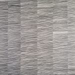Minimalist graphite drawing on paper consisting of many lines in a grid-like structure
