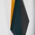 Detail of Tridimensional painting of a black & navy blue prism with triangular sides, looking like a cut gem