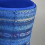 Detail of Bright blue abstract sculpture in mixed media with textile