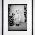 Framed 1960s black & white photograph of a young child wearing ethnic Middle-Eastern garb in a photography studio