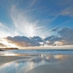 Photograph of Polzeath beach at sunset