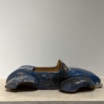 Sir Terence Conran, A glazed pottery model of a blue sports car, together with two clay modelled busts reputedly made...