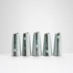 Chris Keenan, 97-99 Trio of tenmoku and celadon rocking bowls with red teardrop