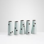 Chris Keenan, 97-99 Trio of tenmoku and celadon rocking bowls with red teardrop
