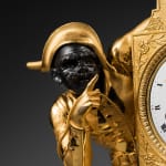 Pierre-Philippe Thomire (attributed to), A rare late Empire 'Harlequin' mantel clock depicting, the case attributed to Pierre-Philippe Thomire, Paris, date...