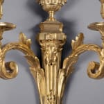 Jean-Charles Delafosse (in the style of), A pair of Louis XVI two-light wall-lights in the style of Jean-Charles Delafosse, Paris,...