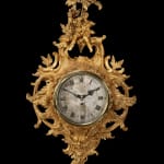 A GEORGE II GILTWOOD CARTEL CLOCK, English, circa 1755