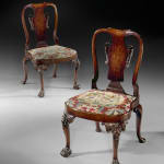 A PAIR OF GEORGE III ARMCHAIRS ALMOST CERTAINLY BY THOMAS CHIPPENDALE , English, circa 1780