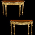 A GEORGE II GILTWOOD ARMCHAIR, The chair: English, circa 1755 The needlework: French, circa 1750