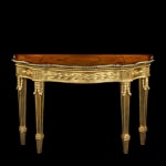 A GEORGE II GILTWOOD ARMCHAIR, The chair: English, circa 1755 The needlework: French, circa 1750