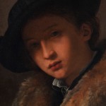 Detail of painting depicting the face of a young boy