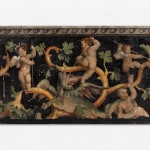 frieze depicting grotesques and a dragon