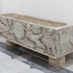 A marble sarcophagus.