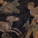 detail of a fresco depicting grotesques and the god Mars