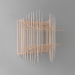 Detail of the perspective of an abstract sculpture made by superimposing numerous balsa sticks, cotton thread and glue.