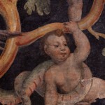 detail of frieze depicting grotesques and a dragon
