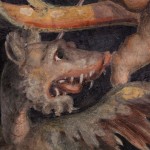 detail of frieze depicting grotesques and a dragon
