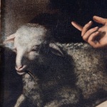Detail of an oil painting of San Giovannino with a sheep.