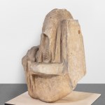 Marble sculpture of a headless female figure.