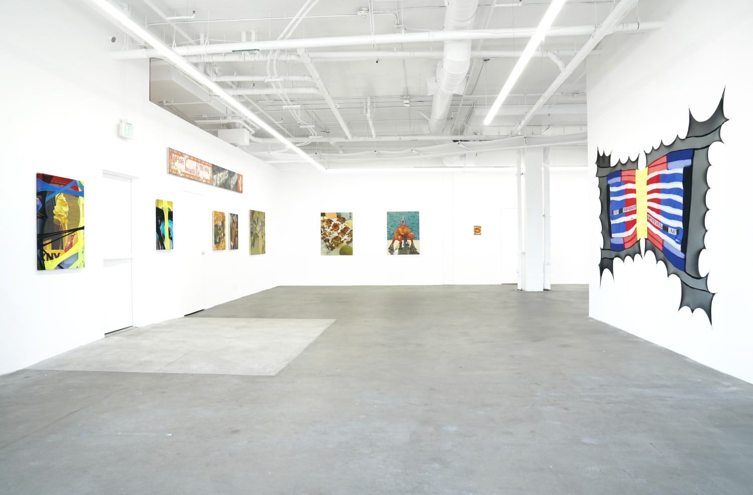 installation view of the gallery with paintings on the walls