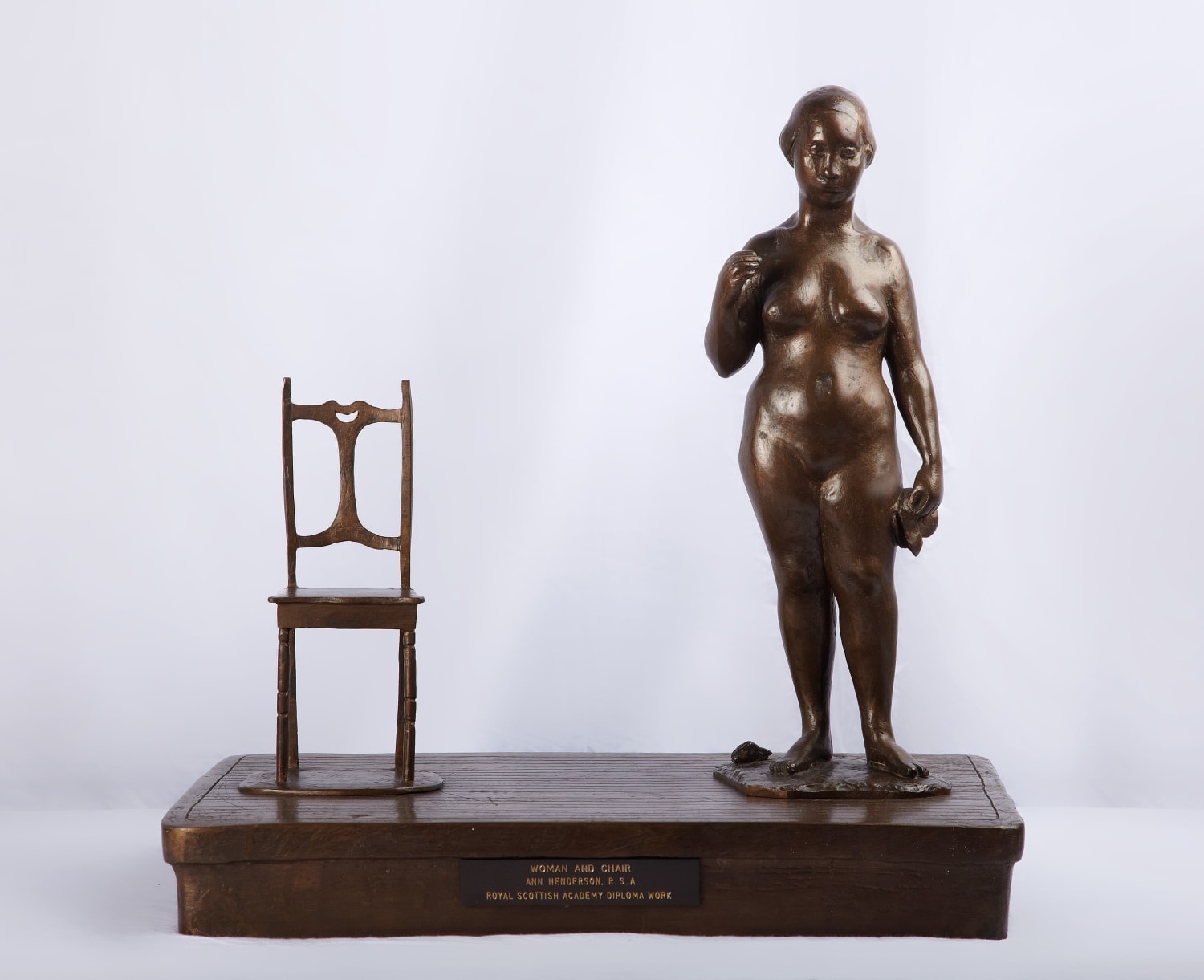 Ann Henderson RSA (1921-76), Woman and Chair  Bronze, around 1976, 46.3 x 45.7 x 33.7cm  RSA Diploma Collection (Deposited, 1976) 2004.058