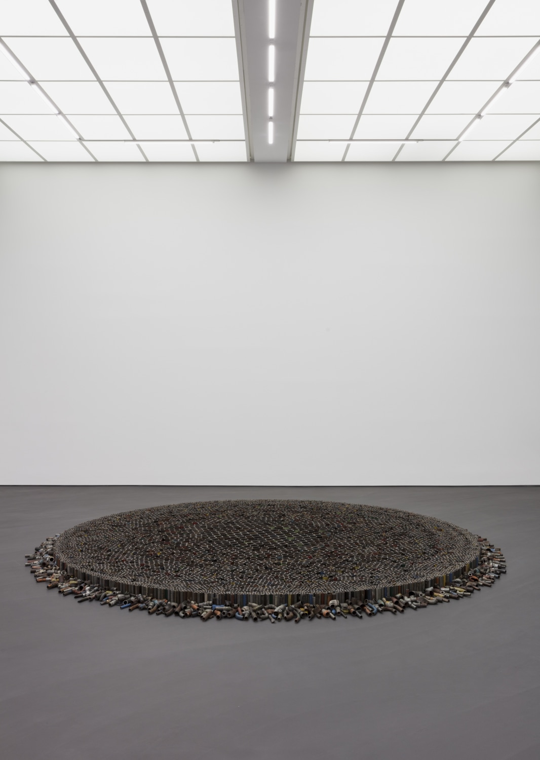 Perfect Society, 2019 Modified heating, water and gas steel pipes ø 4,40 m x 12 cm Photo © Andrea Rossetti
