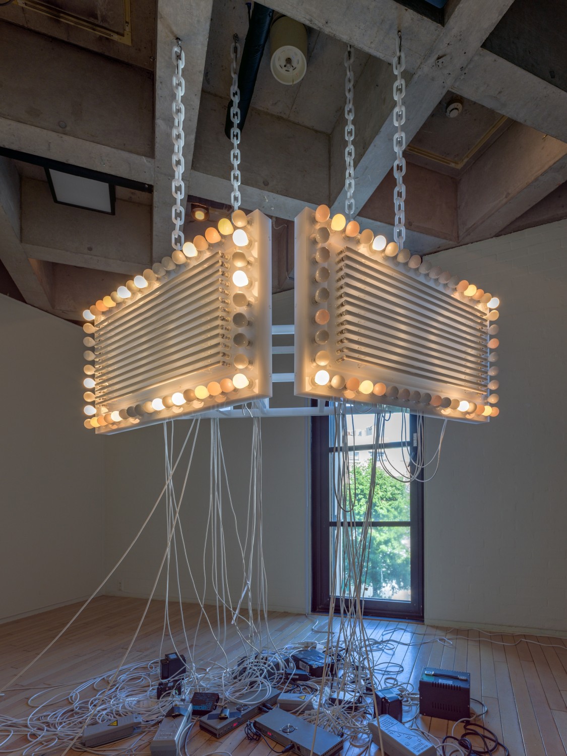 Marquee, 2016 Opaque Plexiglas, lightbulbs, neon tubes, DMX recorder, dimmers, transducers, light and sound program, opaque acrylic chains 60 x...