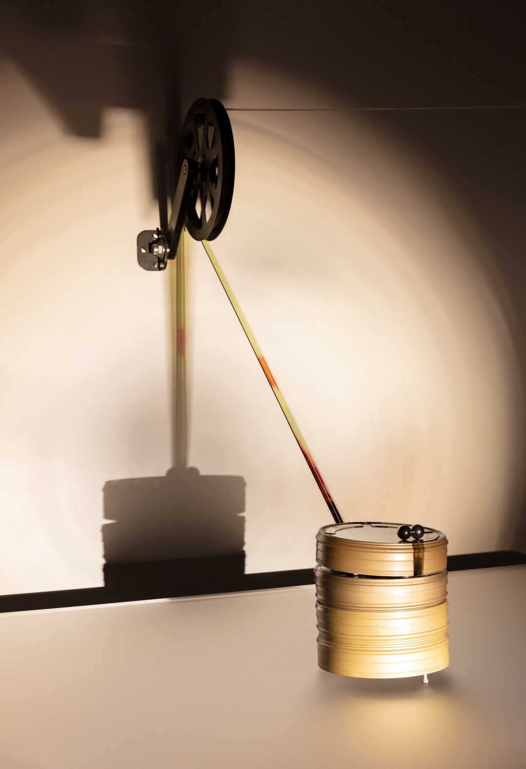 Rosa Barba Boundaries of Consumption, 2012 (detail) Transparent 16 mm film, modified projector, film canisters, 2 metal spheres Dimensions variable...