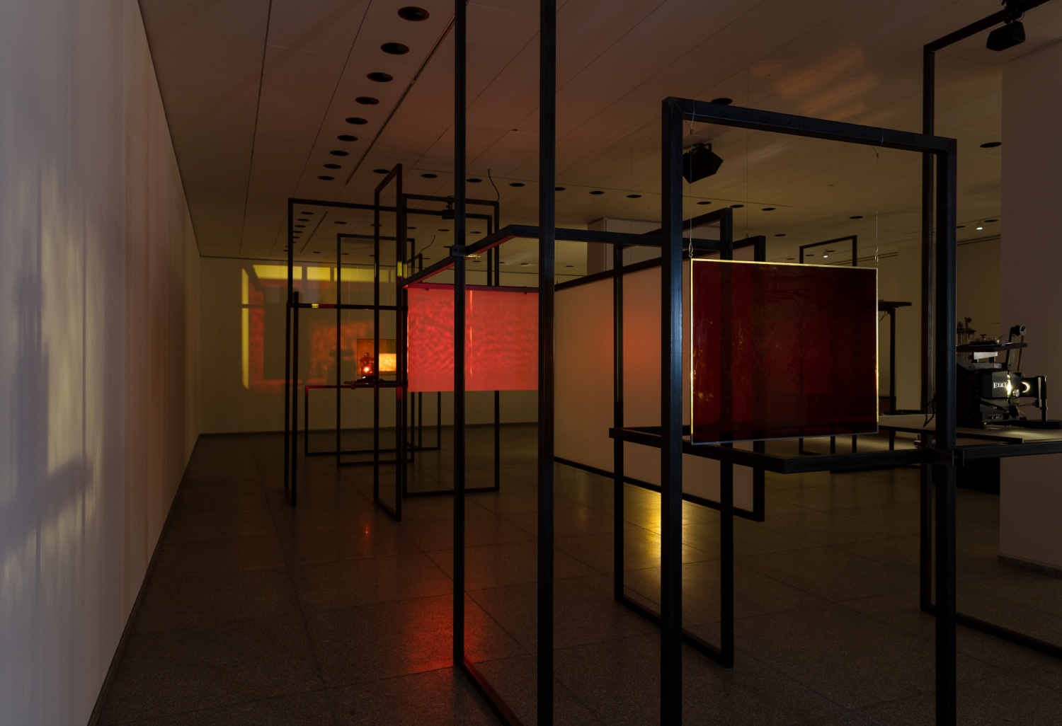 Rosa Barba Hear, There, Where the Echoes Are, 2016/2021 16 mm projectors, 35 mm projector, glass filters, screen, sound, performative...
