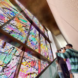 Renderings and Photos of the Obama Foundation Museum Building's 83-Foot Tall Painted Glass Window by Artist Julie Mehretu