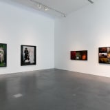 An image containing an installation view of works by Nan Goldin