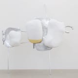 Headgear by Nairy Baghramian, a suspended sculpture made of polished stainless steel and aluminum