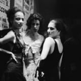 black and white photograph of  Bea, Ivy and Susan in the corner, The Other Side, Boston, 1972 by Nan Goldin