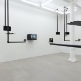 Dara Birnbaum Tiananmen Square: Break-In Transmission, 1990 5 channel color video, 4 channels of stereo sound, surveillance switcher and custom-designed support system Dimensions variable
