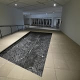 installation view of an interior fountain by Cristina Iglesias