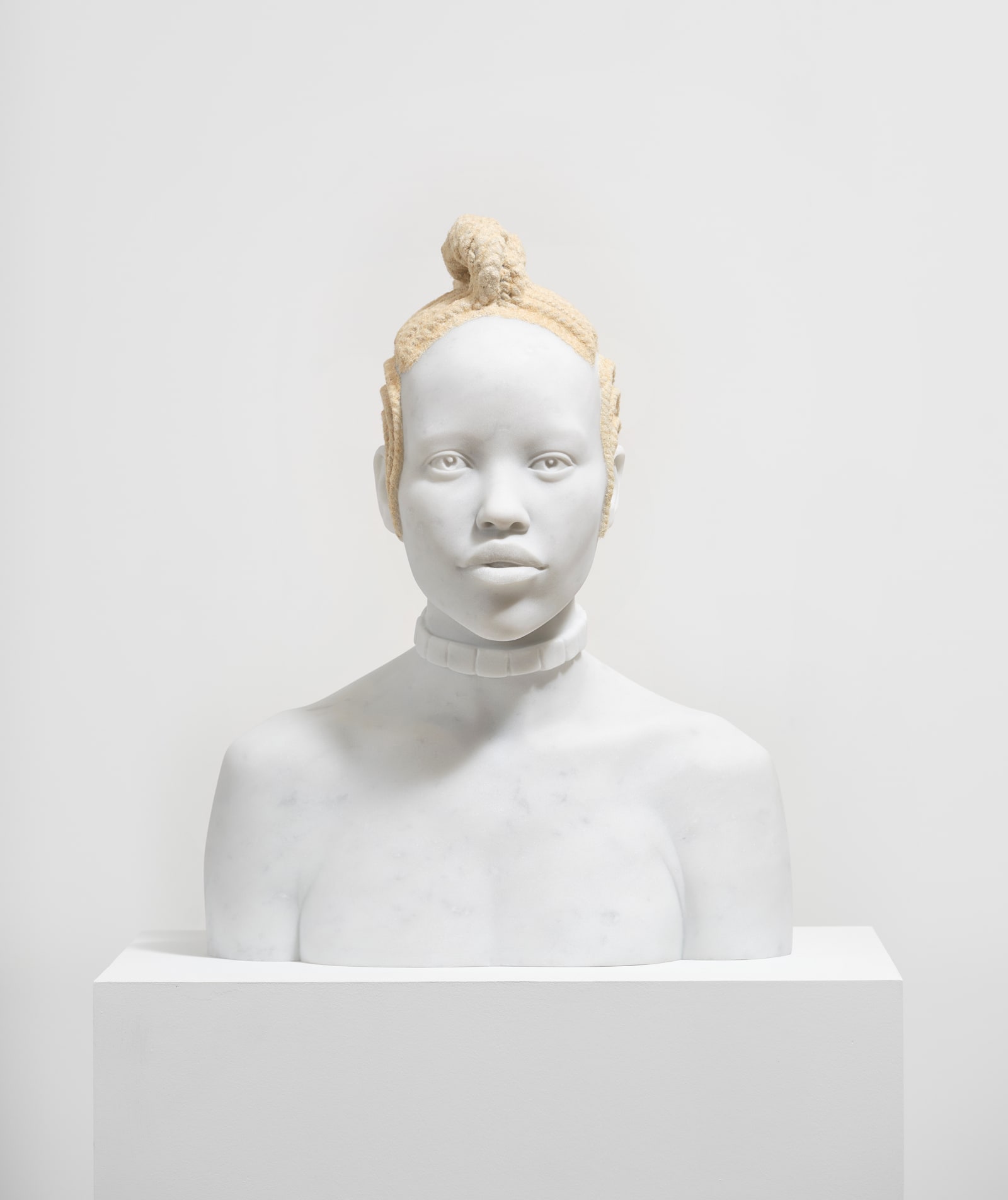 Tavares Strachan Moremi (A Map of the Crown), 2024 Marble, flocked hair 20 1/2 x 16 1/4 x 10 3/8...