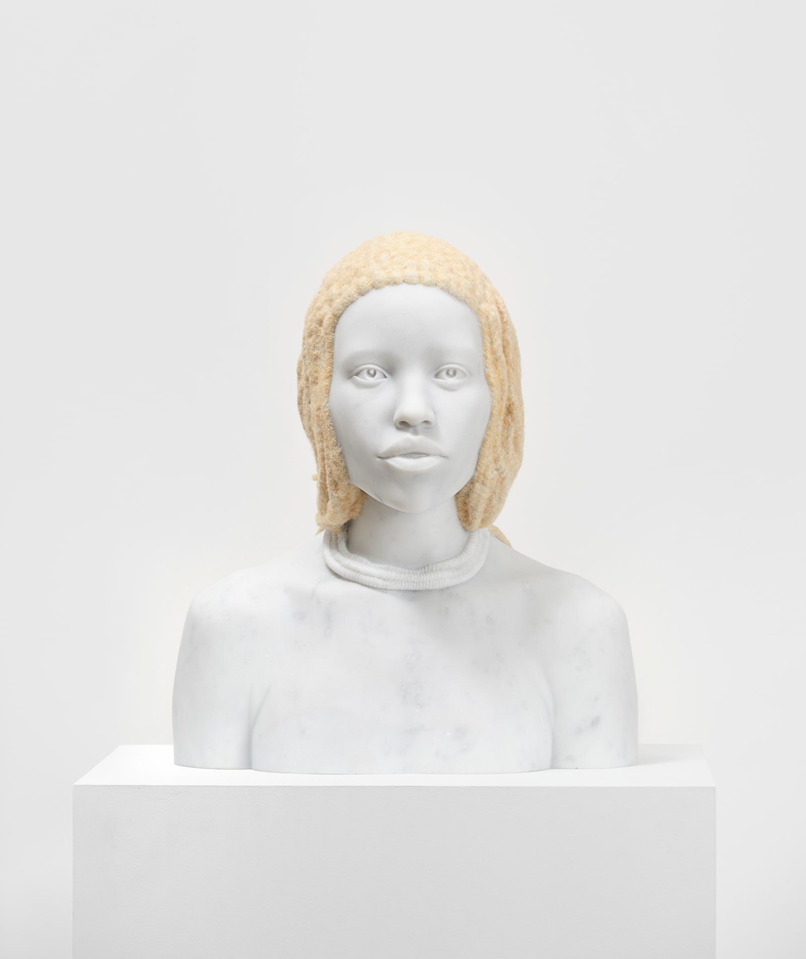 Tavares Strachan Amanirenas (A Map of the Crown), 2024 Marble, flocked hair 18 1/2 x 16 3/8 x 14 1/8...