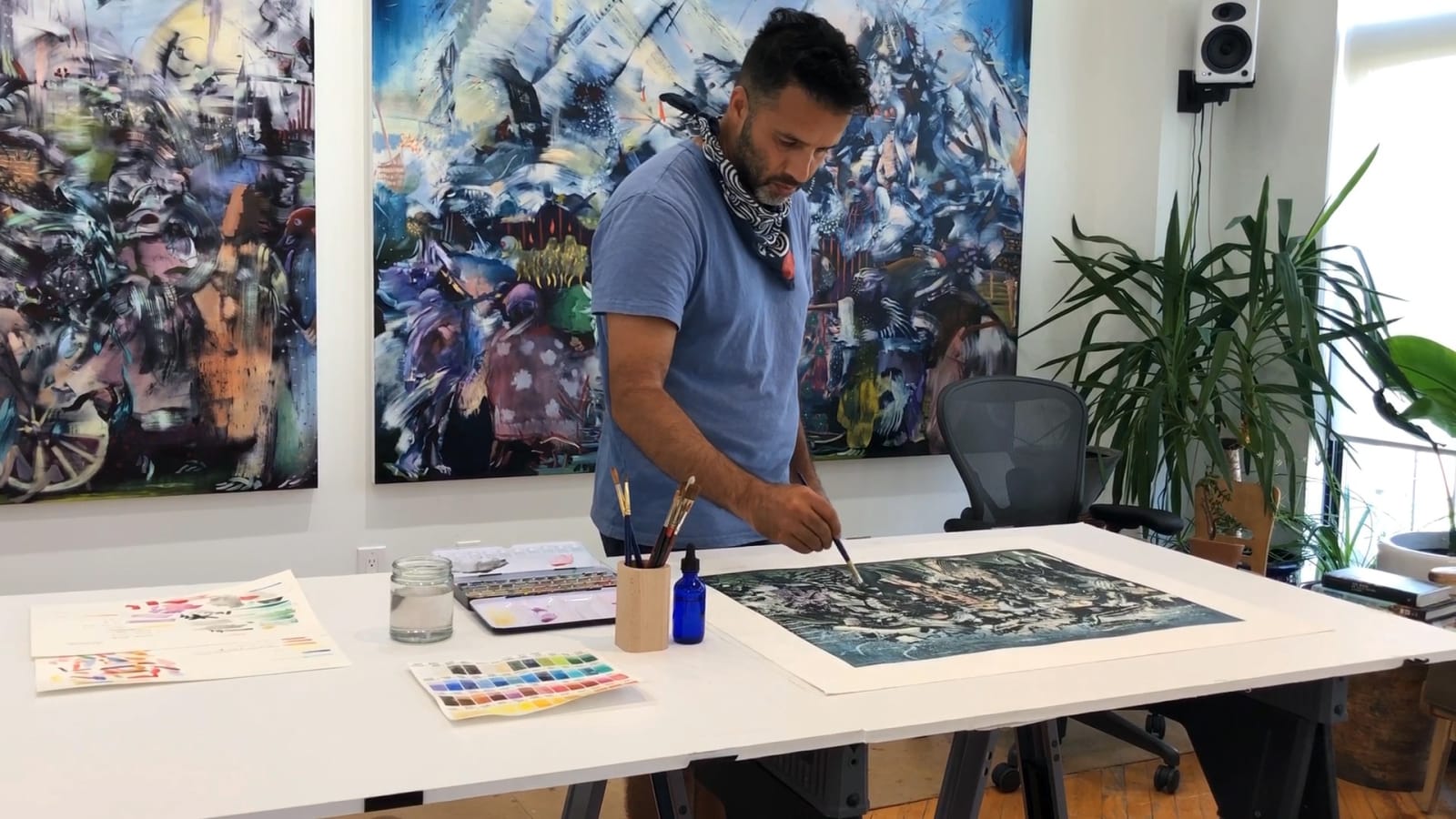 <h6 style="text-align: center;">Ali Banisadr hand-painting his print <i>Nocturne </i>in his studio, New York, 2020.</h6>